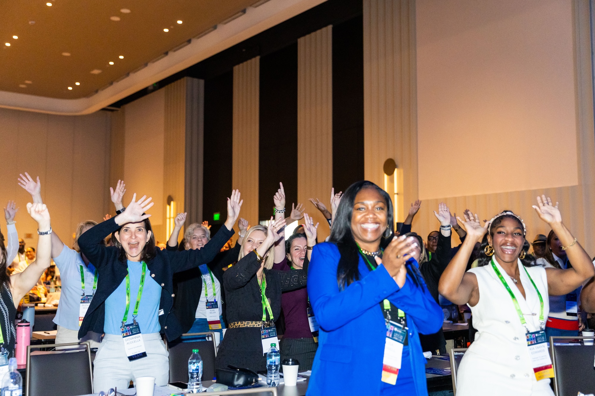 Child Care Success Summit attendee celebrating during the event
